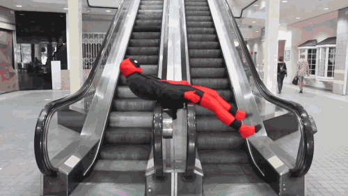 Spiderman-on-escalator-GIF.gif